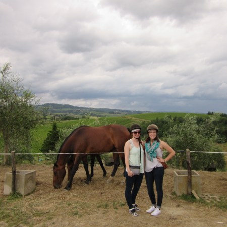 Rolling hills of Tuscany can be seen from the barn