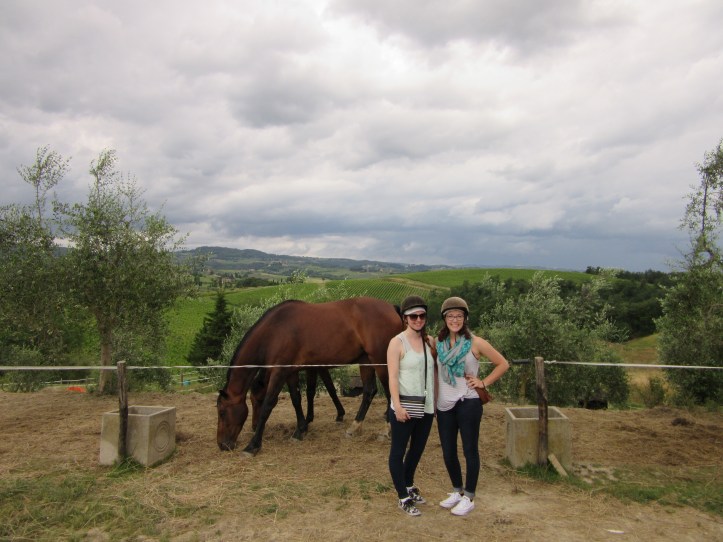 Rolling hills of Tuscany can be seen from the barn